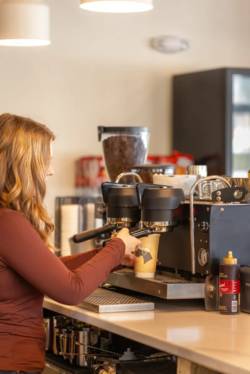 Barista at the espresso machine