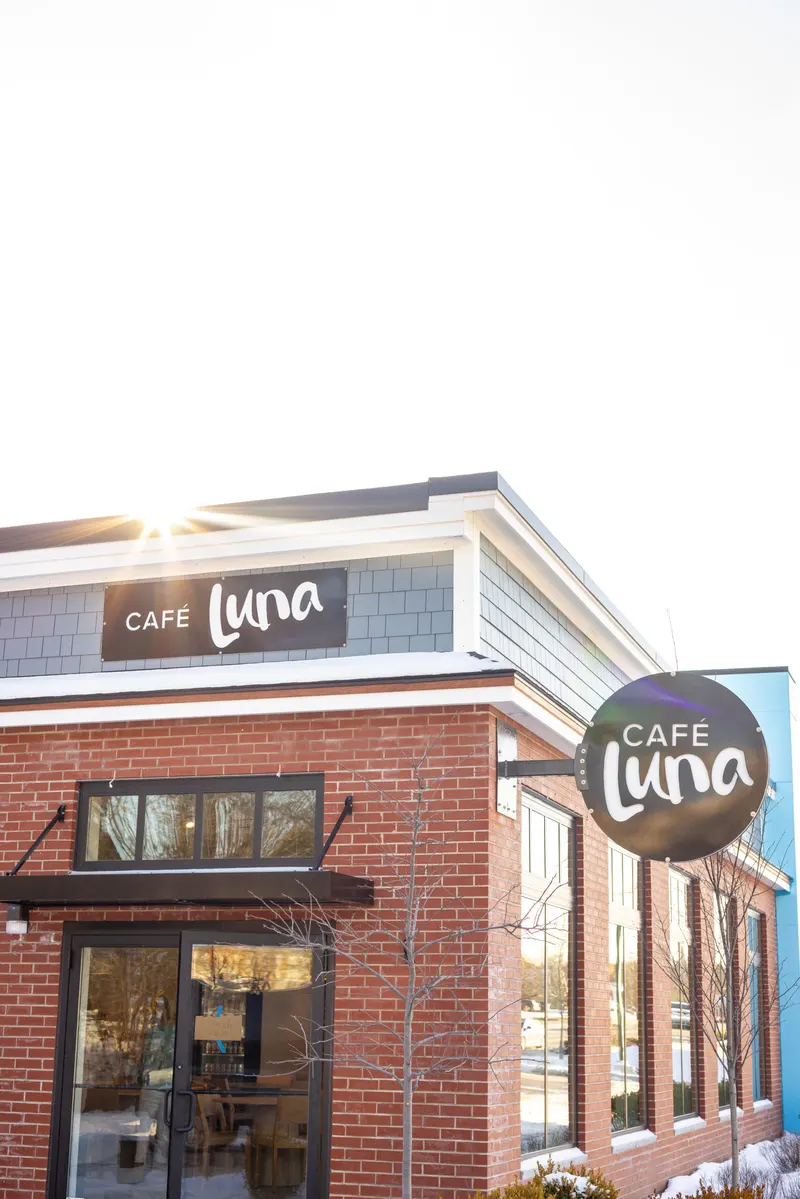 Café Luna storefront with the round Luna sign