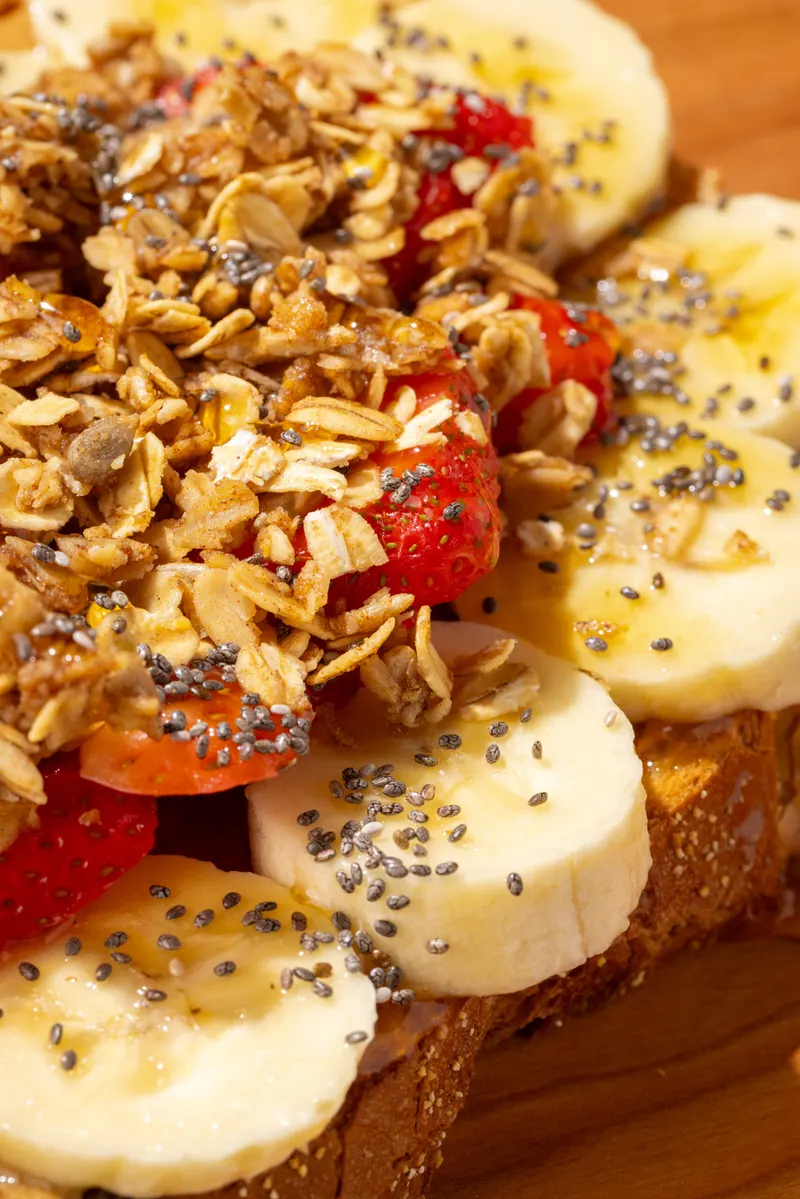 Banana, strawberry and granola toast with chia seeds